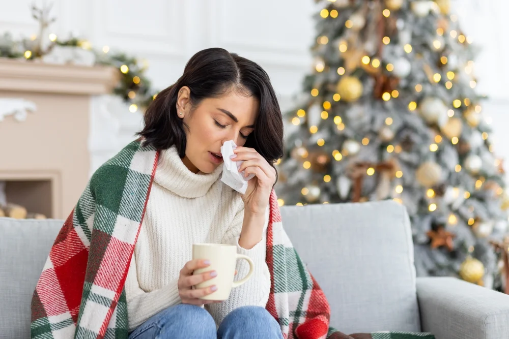 Woman experiencing a Christmas Tree Allergy